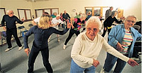 photo by David N. Seelig  Diane Olson leads an enthusiastic, older-adult class at the Sun Valley Athletic Club.